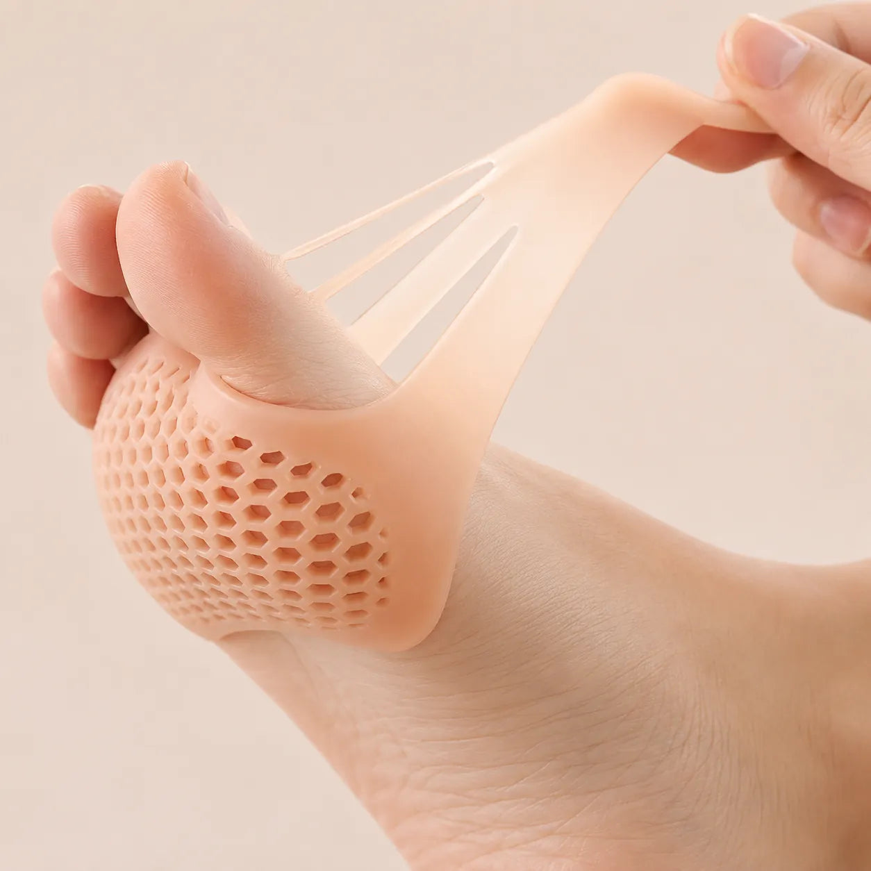 Coussinets élastiques pour l'avant-pied en silicone avec structure en nid d'abeille respirante pour un ajustement confortable.