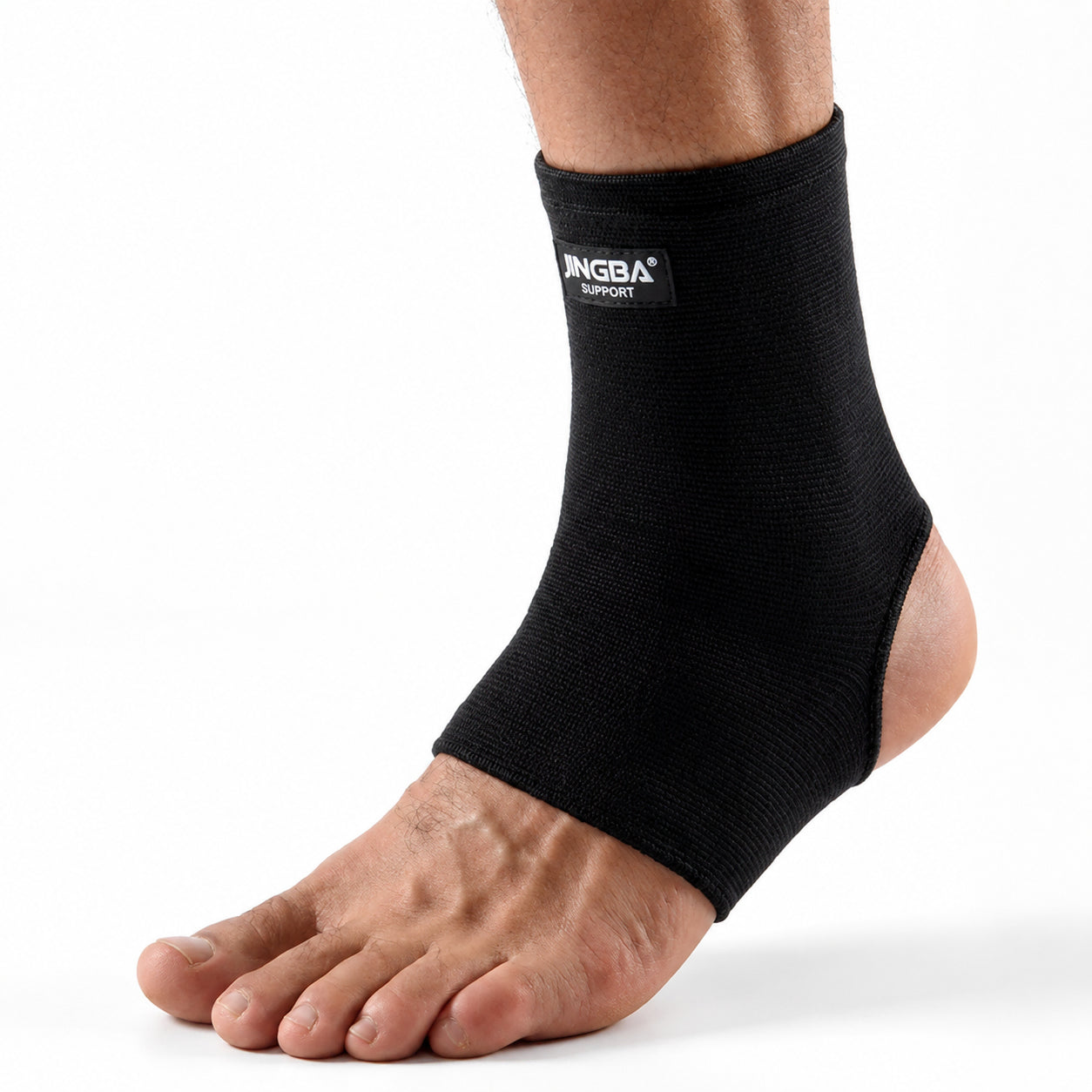 Chevillère de compression noire avec ajustement élastique et talon ouvert.