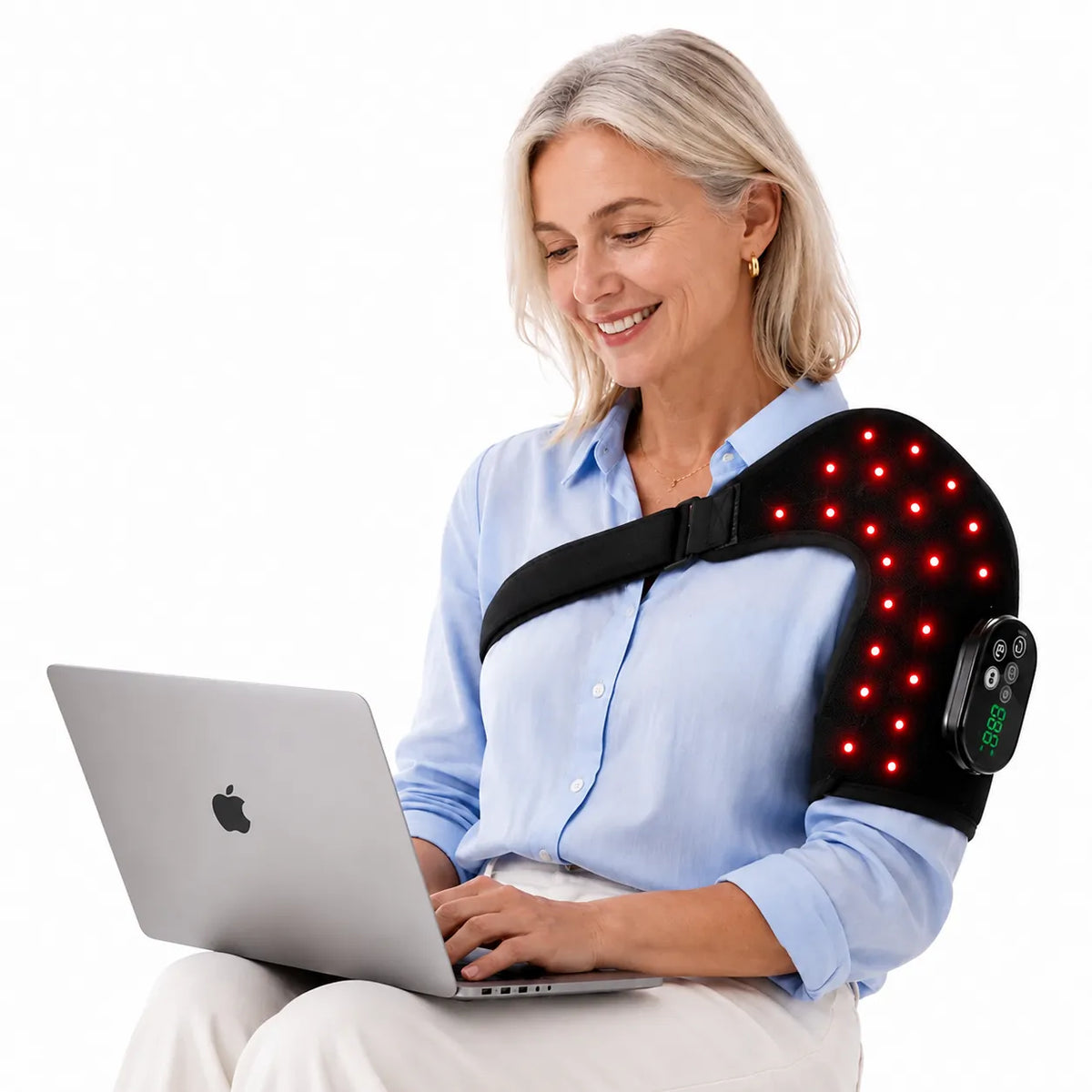 Ceinture d'épaule avec massage et lumière rouge lorsqu'elle est utilisée devant un ordinateur.