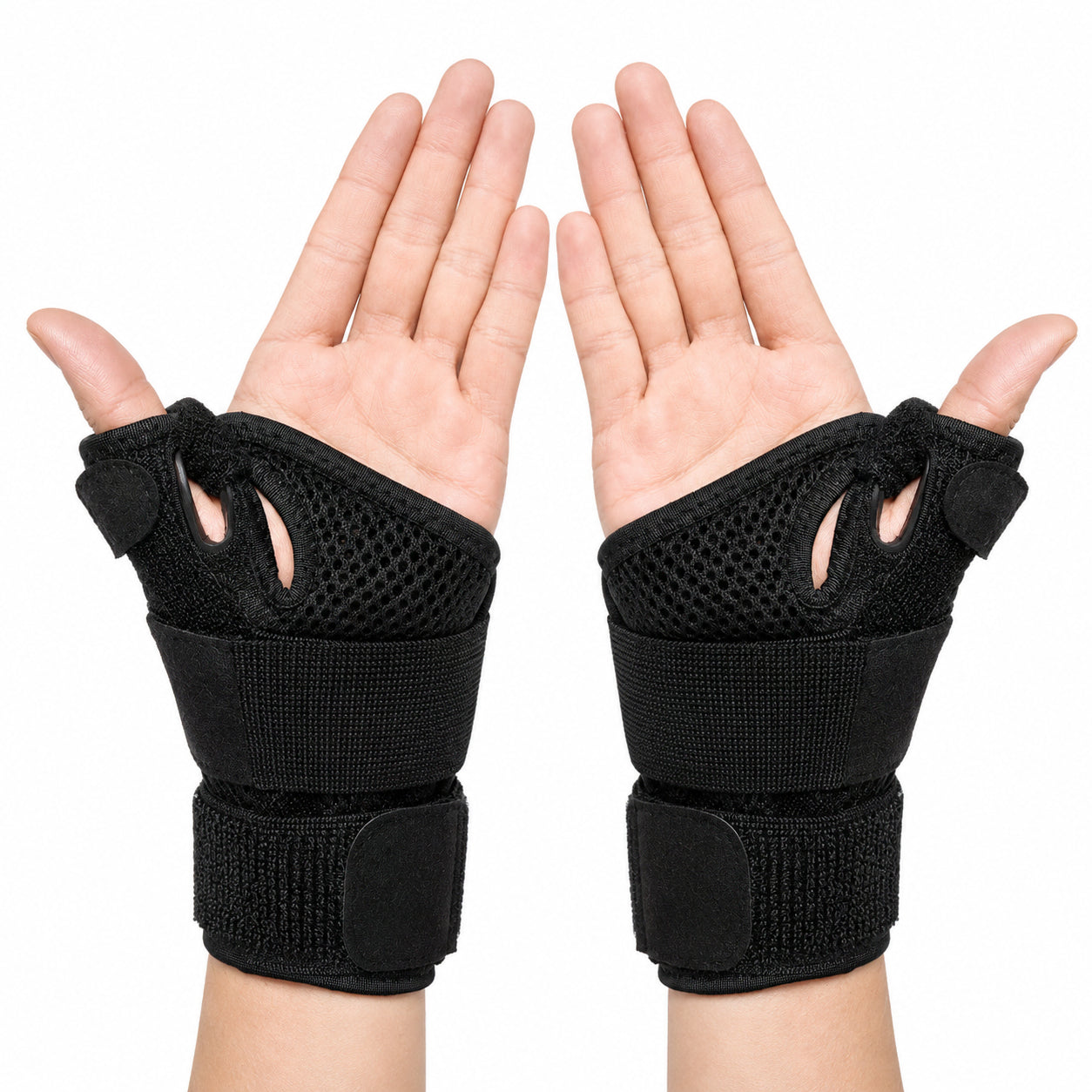 Attelle de poignet réglable avec soutien du pouce et bande velcro stabilisatrice, vue côté paume.