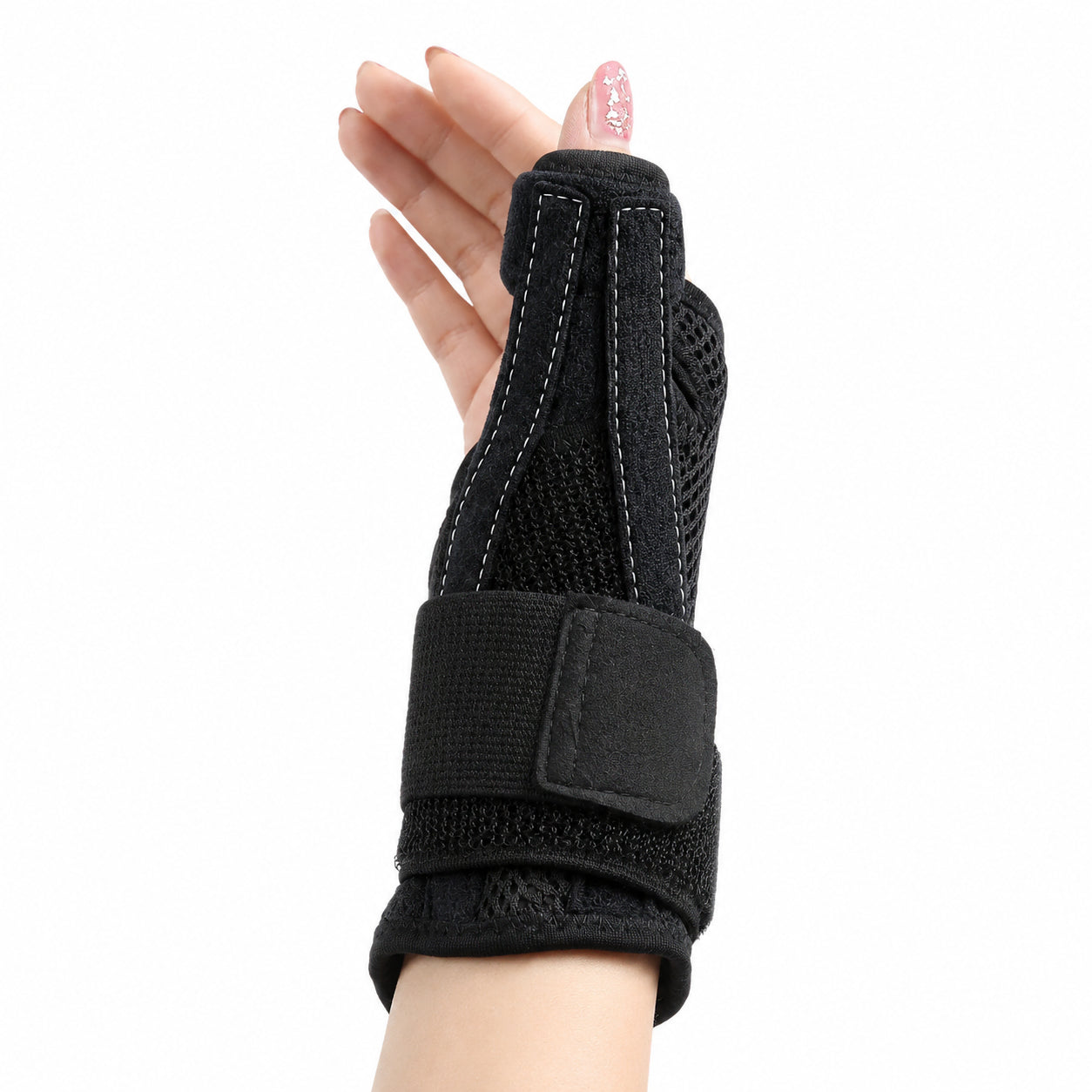 Attelle de poignet avec attelle intégrée, soutien du pouce et bande velcro réglable pour une stabilité supplémentaire du poignet.