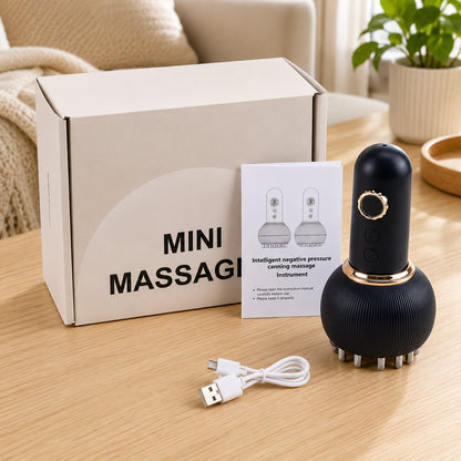 Massage électrique Gua Sha avec câble de charge USB, emballage et manuel d'utilisation dans l'environnement domestique.