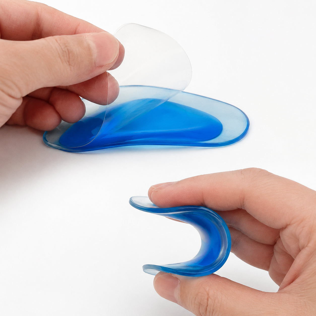 Demi-semelles flexibles en silicone avec face auto-adhésive pour le soutien de la voûte plantaire et le soulagement de la pronation.