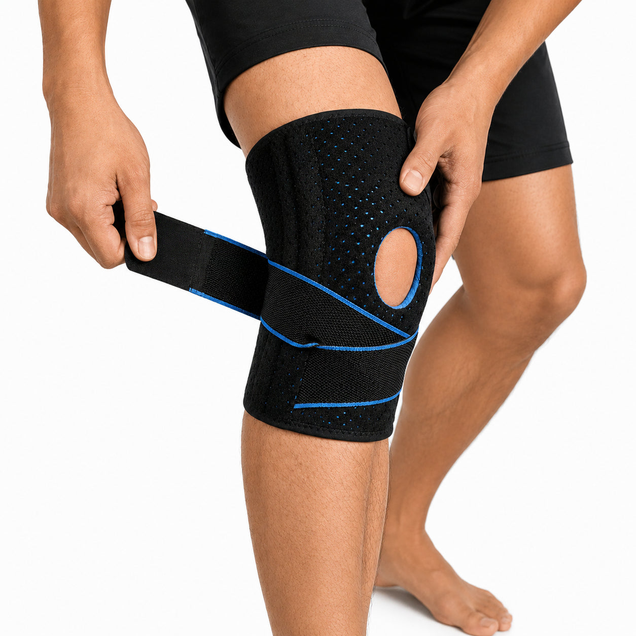 Genouillère avec doubles stabilisateurs latéraux, ouverture pour la rotule et bande de compression réglable pour un soutien stable de l'articulation du genou.
