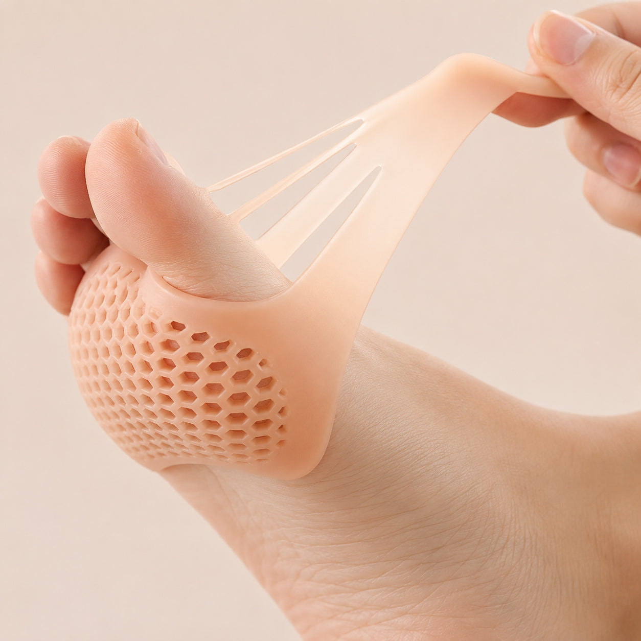 Coussinets élastiques pour l'avant-pied en silicone avec structure en nid d'abeille respirante pour un ajustement confortable.