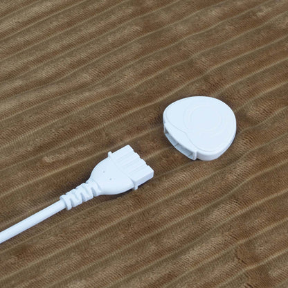 Närbild på Terraillon Koomys avtagbara kabelkontakt på den randiga flanellsidan